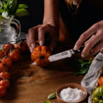 Everyday Set 2 German steel cold forged serrated Utility Knife cutting up vegetables.