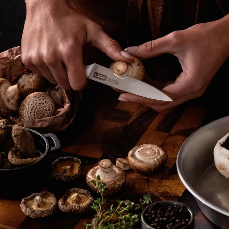 Everyday Set 3 German steel cold forged Utility Knife cutting up mushrooms.