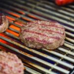 Steaks Grilling on a Stainless Steel grill
